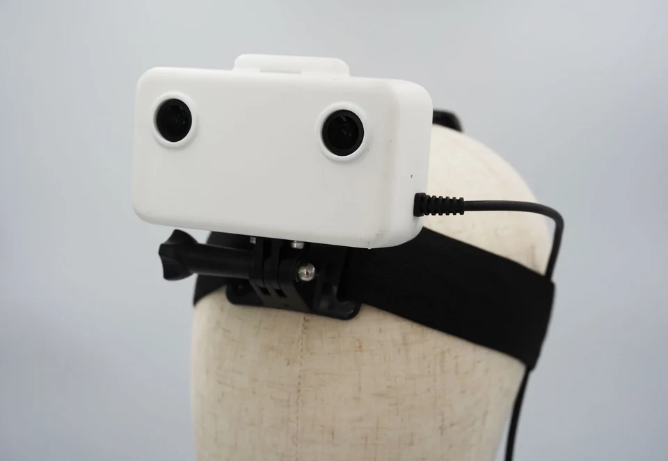 GI Labs Ego1 stereo camera mounted on its headband.